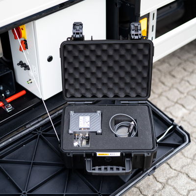 A black case lined with padding material, containing the DOLL RDS Remote Diagnostic System